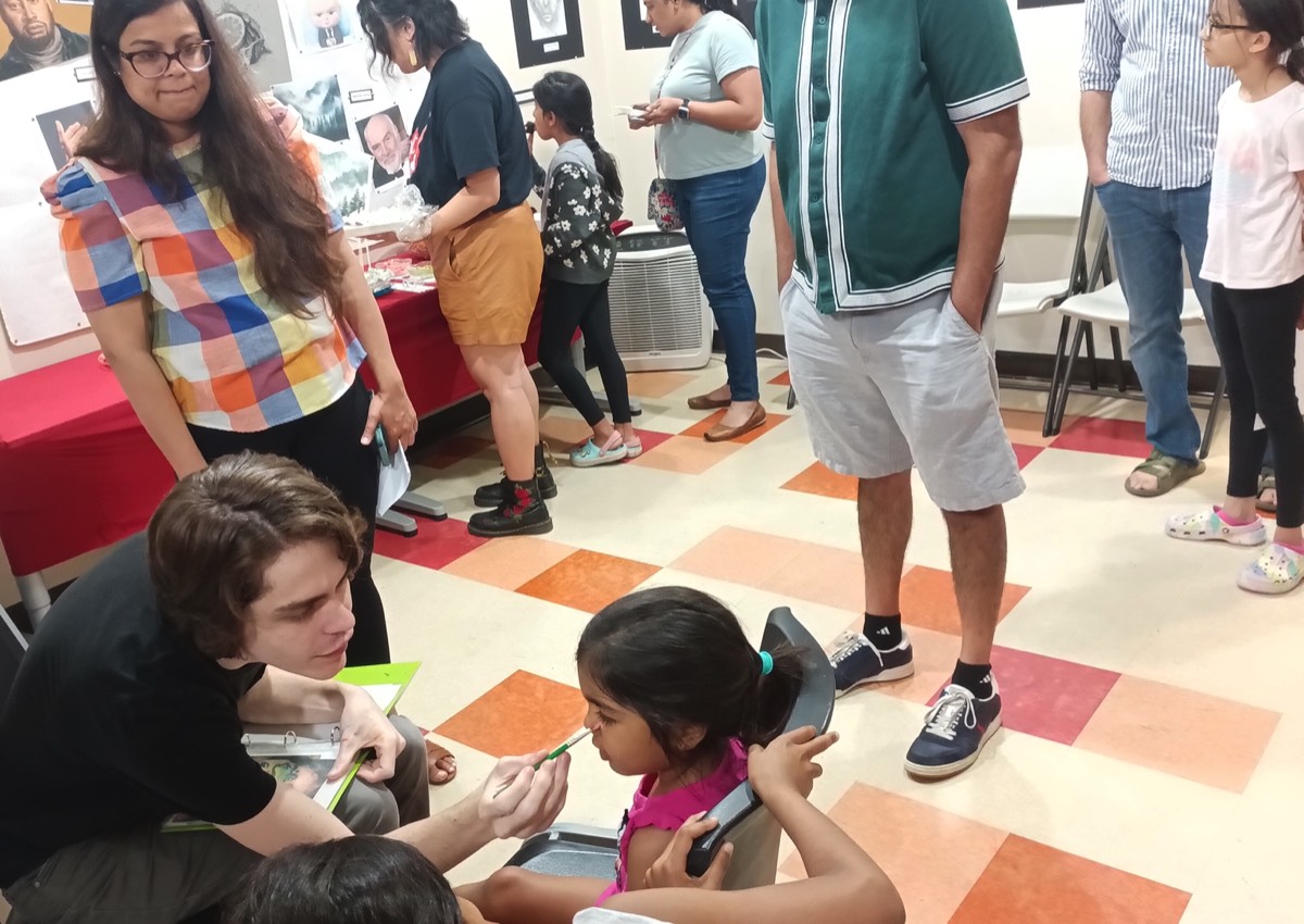 kids getting their faces painted