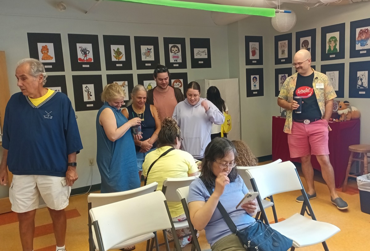 visitors admiring artwork